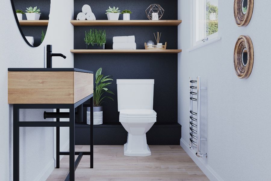A bathroom with a sink and toilet Description automatically generated