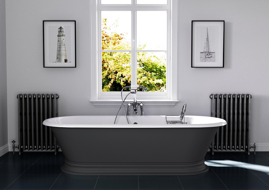A bathtub in a bathroom Description automatically generated