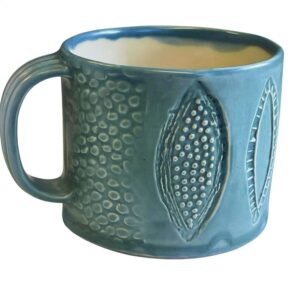 A blue mug with a handle Description automatically generated
