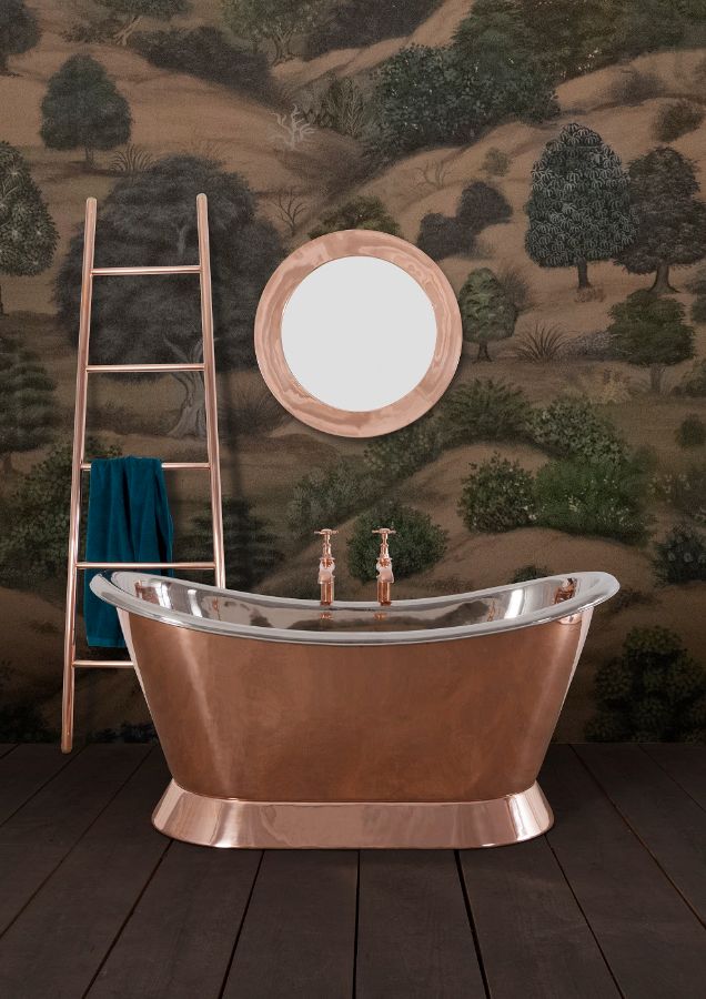 A copper tub in a bathroom Description automatically generated