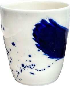 A white and blue cup Description automatically generated