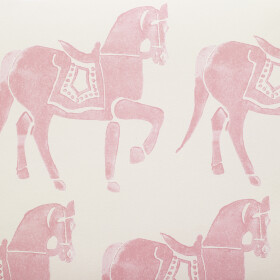 A pink horse with saddles Description automatically generated
