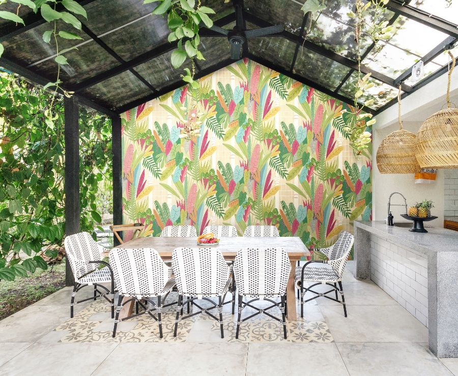 A table and chairs in a covered patio

Description automatically generated