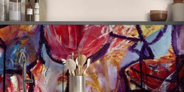 a glass kitchen splashback in bright colours from Red Dog Glass Design. In situ in a kitchen