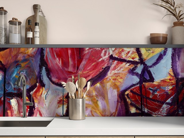 a glass kitchen splashback in bright colours from Red Dog Glass Design. In situ in a kitchen