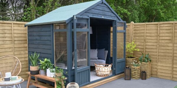Thorndown Cavepool Grey colour on a wooden summerhouse in a garden