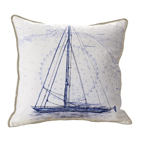 a cushion showing coastal inspired design of an unrigged sailing boat in blue and white