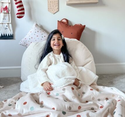 girl with fleece lined blanket
