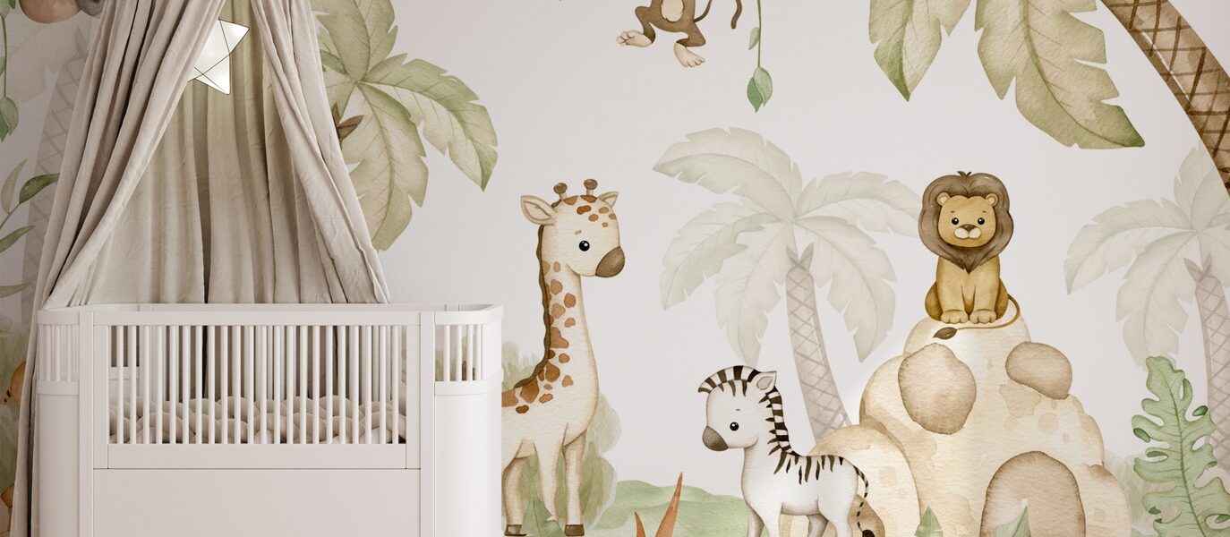 A baby's room with a cute jungle-themed wall mural, featuring cartoon animals