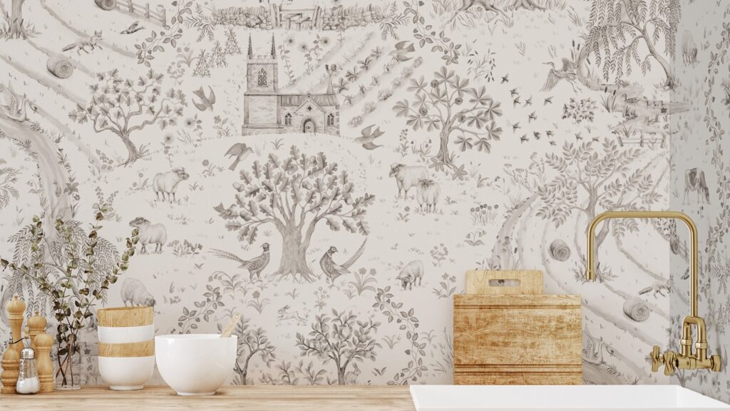 The image features a pastoral wallpaper design that seems to evoke the charm of a countryside daily walk. The sepia-toned illustrations include a variety of elements from rural life such as trees, farm animals like sheep, wild birds, and structures that could be farm fences or parts of a small rural church. The calm and detailed scenery suggests a tranquil harmony with nature. This wallpaper is used as a backdrop for what appears to be a kitchen setting, with wooden utensils and ceramic containers in the foreground, complemented by a brass faucet, enhancing the rustic aesthetic of the space. The overall effect is both nostalgic and inviting, creating a warm atmosphere.