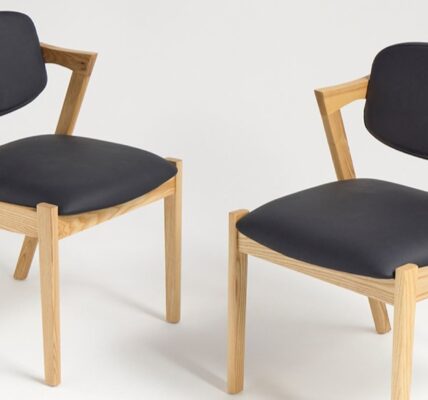 Two modern dining chairs with a clean and minimalist design