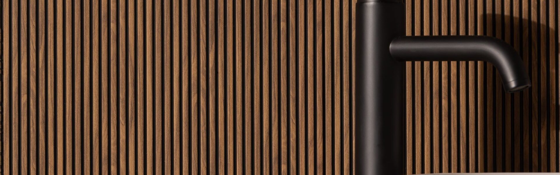 Microslat wall panels adds visual interest and warmth to the space.