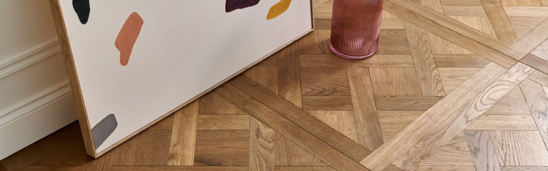 Beautiful wood panelling in an ornate pattern. The wood appears to be a light oak colour with a natural finish.