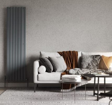 This image shows a serene sanctuary with the perfect blend of colours and texture and a large, vertical radiator