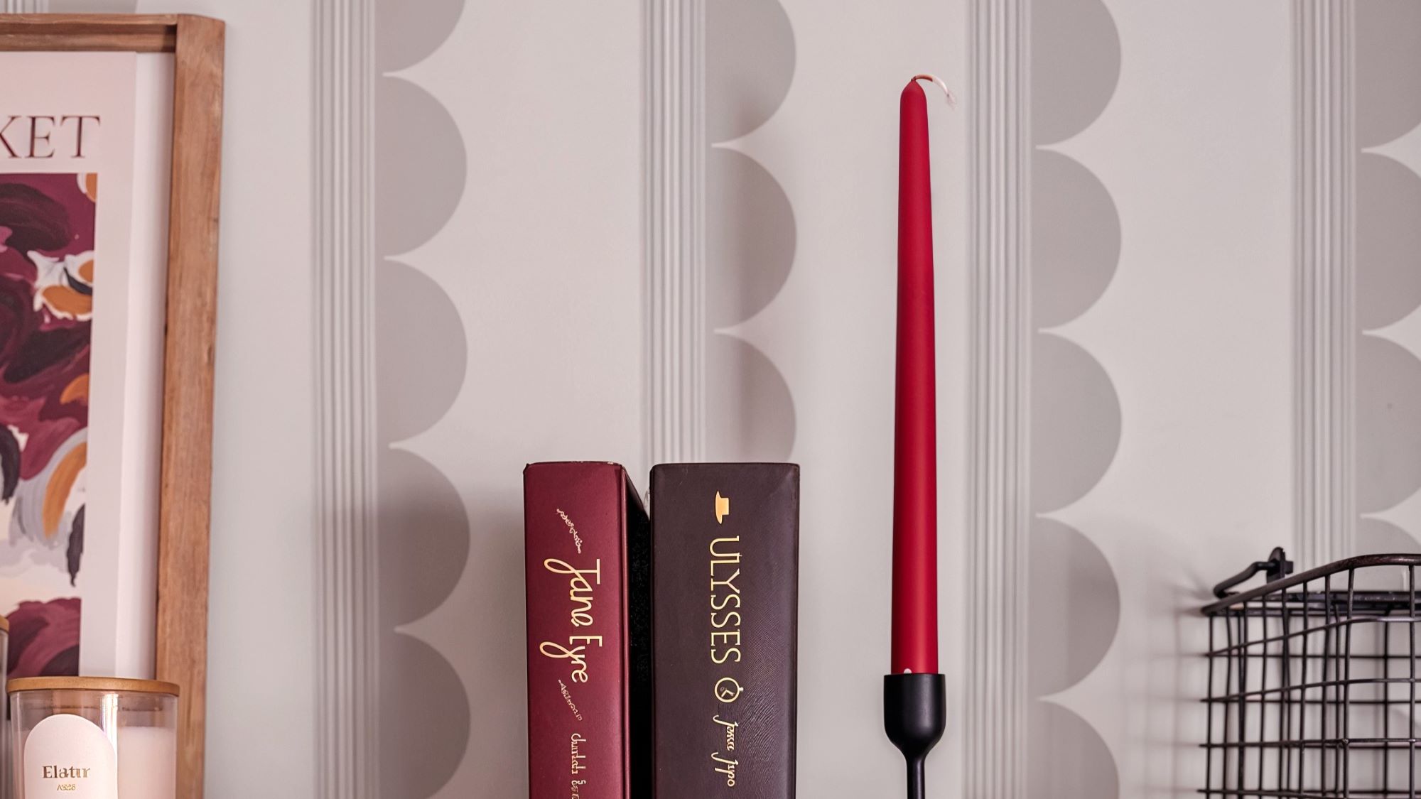 A patterned wallpaper with vertical lines and a subtle design of overlapping circles.