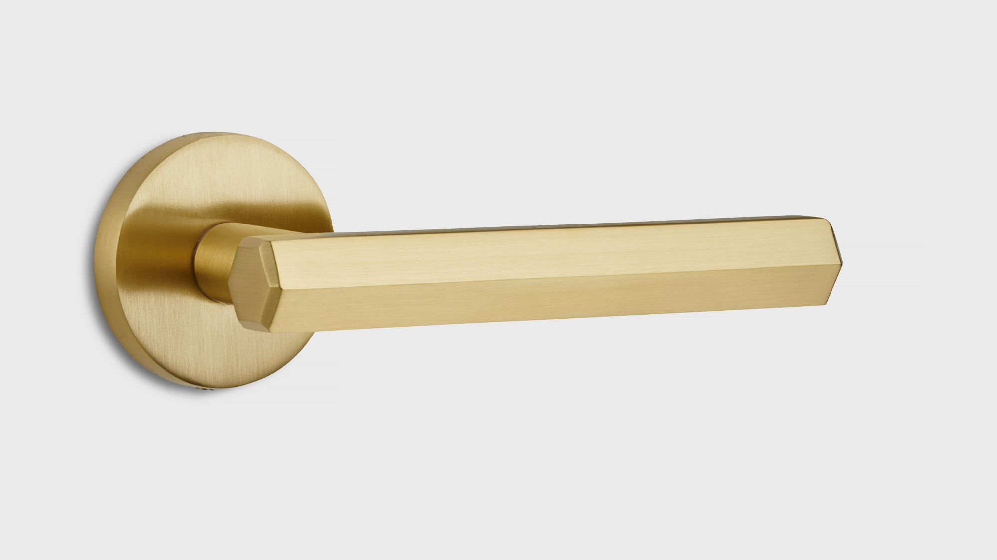A gold door handle. This type of handle is commonly used for interior doors and offers a sleek, contemporary aesthetic.