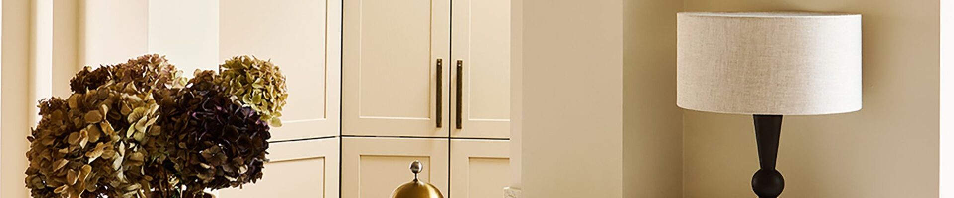 The image shows Thorndown's Whey White Wall Paint. It's an off-white cream with a light, buttery hue and a flat matt finish. It's an eco-friendly, water-based paint with minimal VOCs, and is designed to be durable and washable. It can be used on walls, ceilings, metal radiators, and interior wood like furniture and trim.