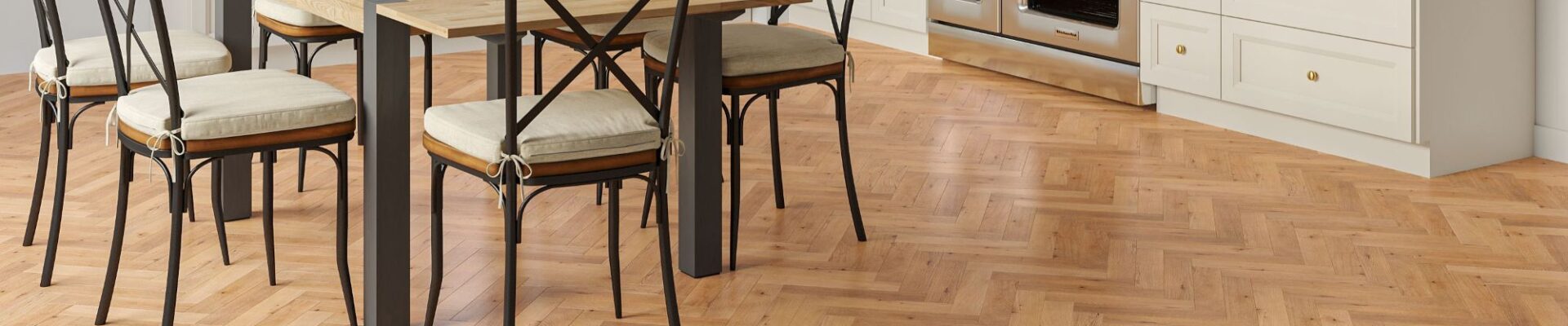 A beautiful, timeless wood floor that works well with the neutral shaker-style cabinets and wood countertops in the photo!