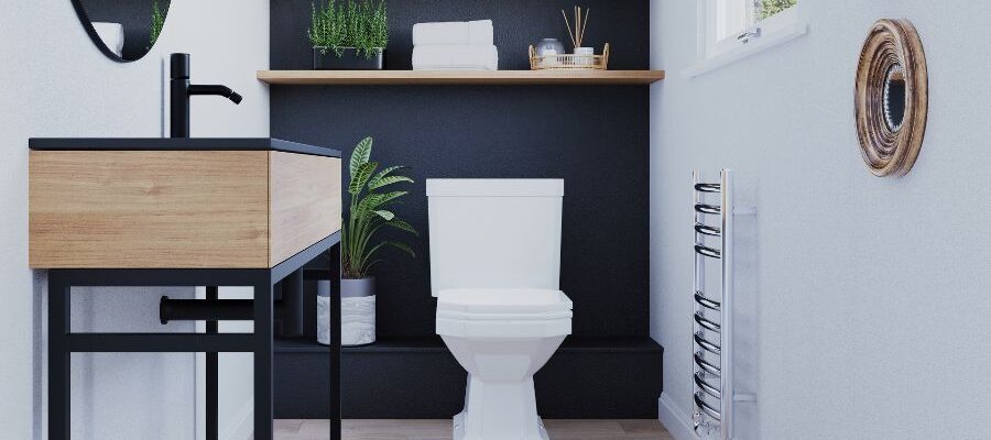 A bathroom with a sink and toilet Description automatically generated