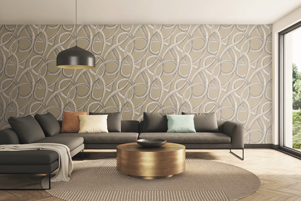 A living room with a couch and a coffee table Description automatically generated