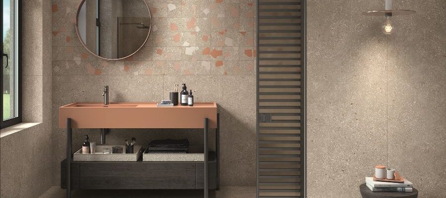 an example of mindful minimalism showing a modern bathroom featuring sandstone effect floor tiles from Porcelain Superstore