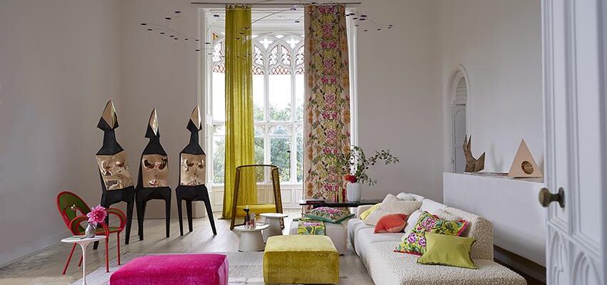 A roomset image showing ghirlanda fabric being used on curtains and cushions