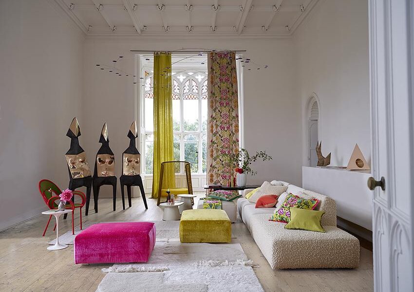 A roomset image showing ghirlanda fabric being used on curtains and cushions