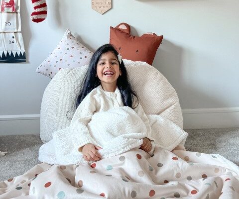 girl with fleece lined blanket