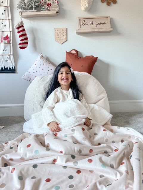 girl with fleece lined blanket