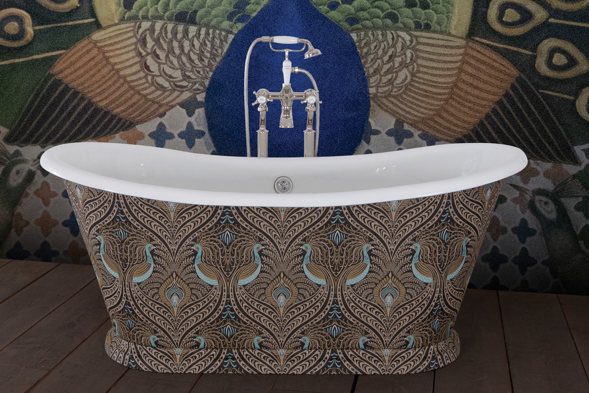 The image showcases a luxurious freestanding bathtub with a bold maximalist design, set against a similarly ornate background. The exterior of the tub is adorned with a peacock feather pattern, rendered in a palette of rich browns, golds, and teals. This intricate pattern gives the tub an opulent and bespoke appearance. The bathtub fixtures are traditional in style with a chrome finish, adding a touch of timeless elegance to the modern expression of maximalism. Behind the bathtub, a peacock-themed wall mural complements the tub's design, featuring an expanded tail in a display of vibrant green, blue, and gold hues, set against a deep blue background. The floor is a wooden texture, providing a warm, natural contrast to the cool tones of the tub and wall. The overall effect is one of lavishness and artistic flair, making a striking statement in this maximalist bathroom setting.