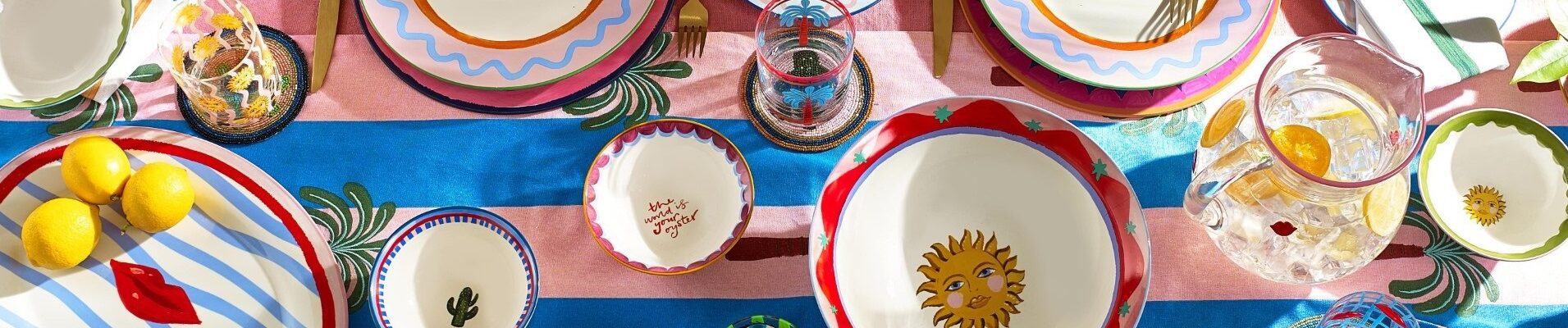 birds eye view of lots of colourful tableware on a table