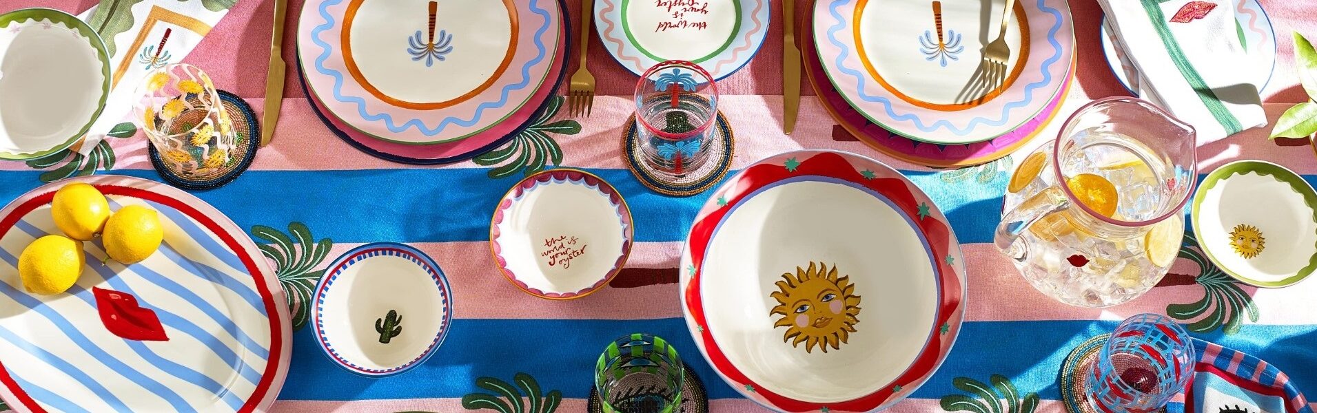 birds eye view of lots of colourful tableware on a table