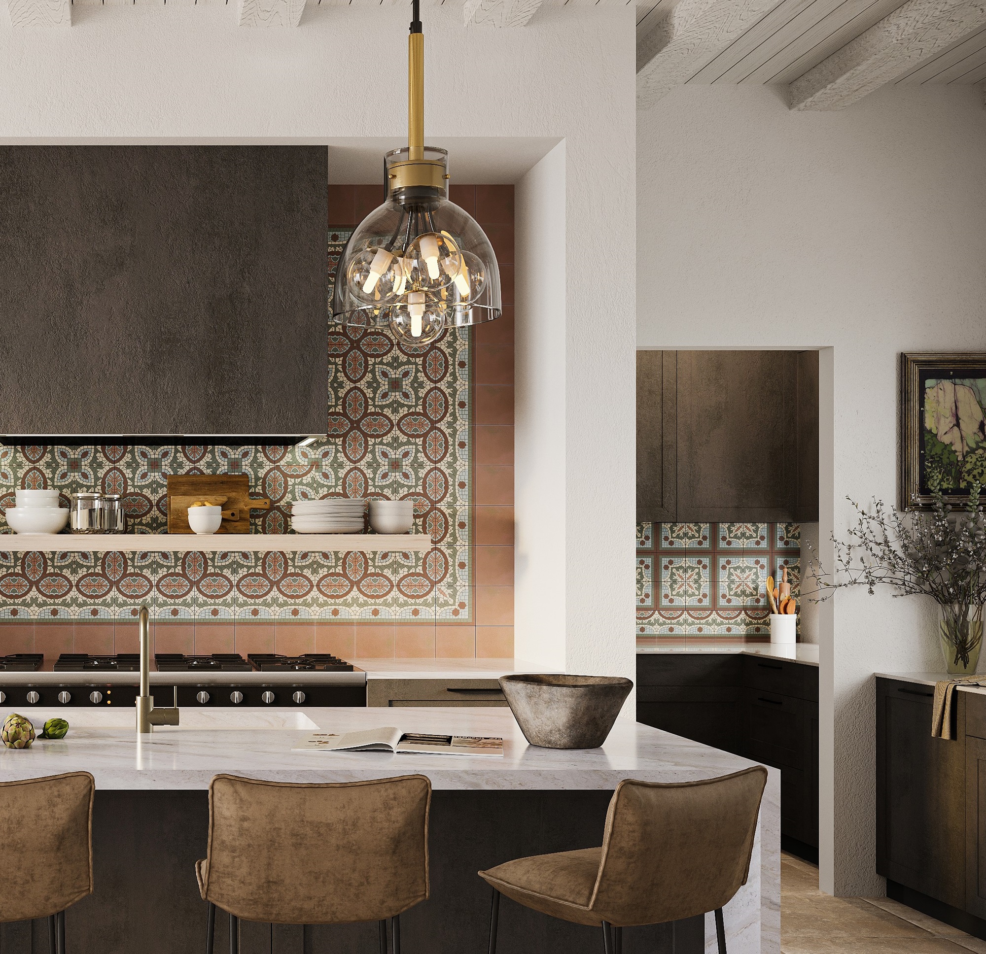 A kitchen with a stainless-steel stovetop oven and a black pendant light hanging from the ceiling. The countertop is a light-coloured stone with a mottled pattern. There are grey veined tiles on the wall behind the stovetop.