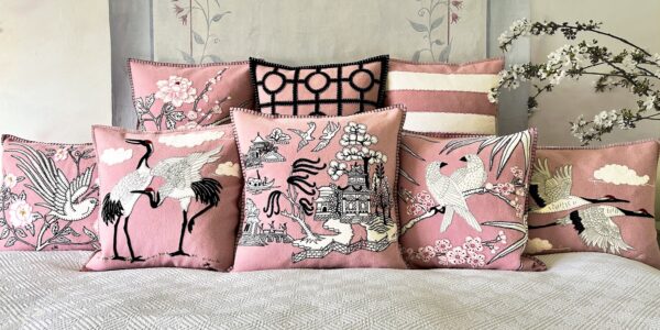 A bed piled high with pillows