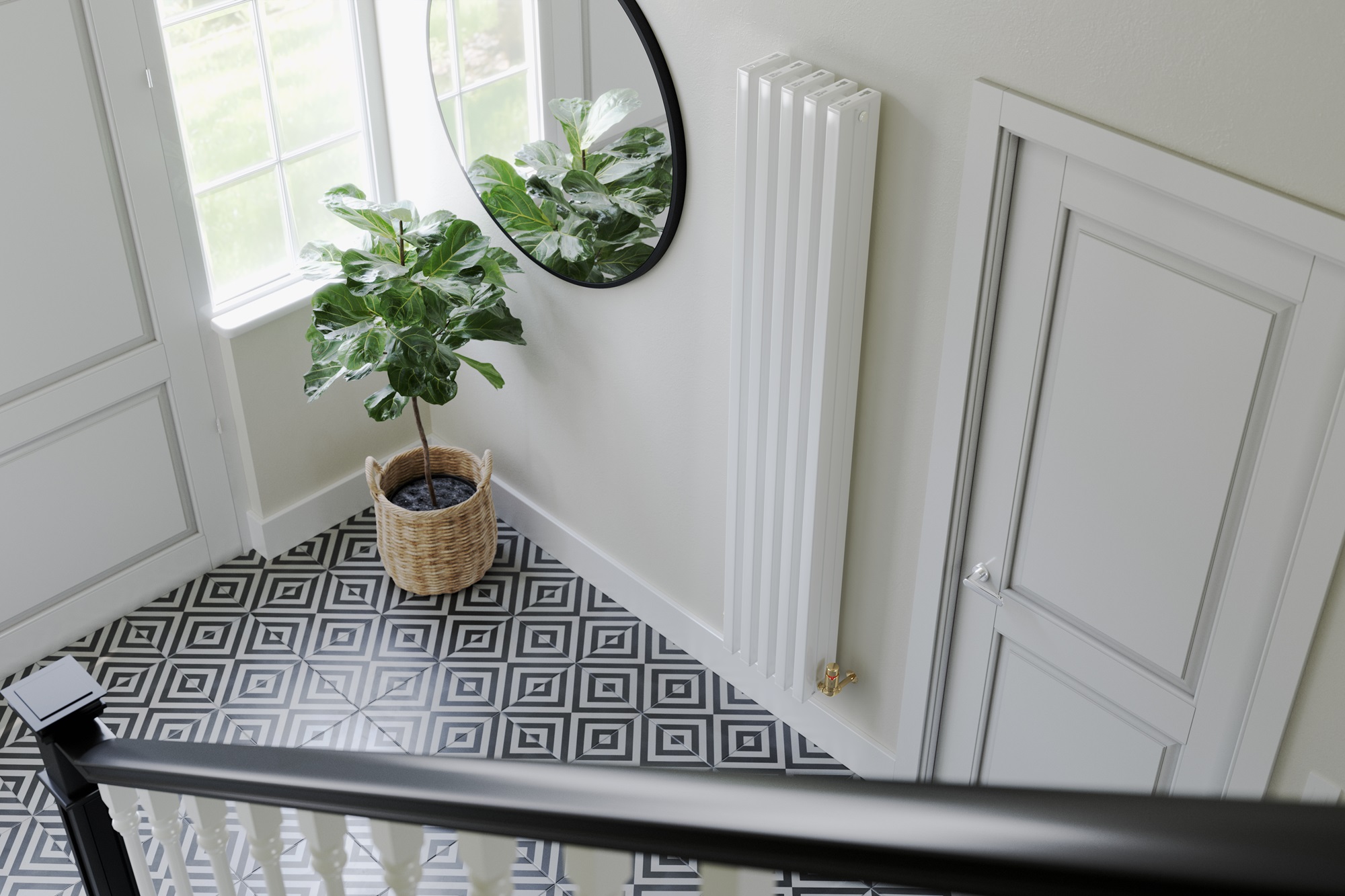 A stylish, narrow, modern radiator on the wall. A potted fiddle-leaf fig plant sitting on a console table beneath a rectangular mirror in a brightly lit hallway.