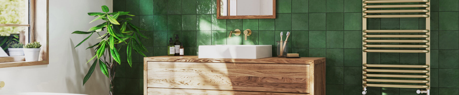 Bathroom with green tiles and wooden vanity