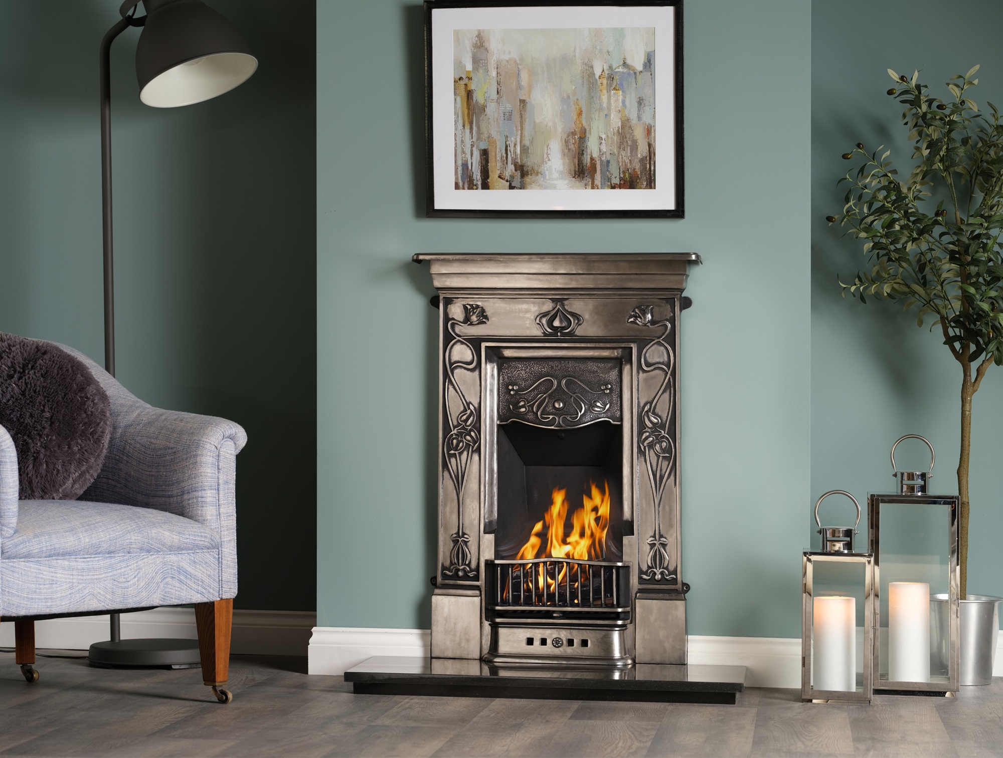 A cast iron fireplace with a fire burning in the grate. The fireplace is in a traditional living room setting, with an armchair next to it.