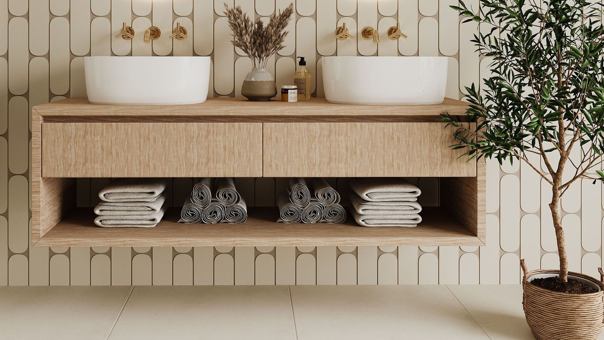 A bright bathroom with a double vanity unit, two sinks, and a houseplant for decoration.