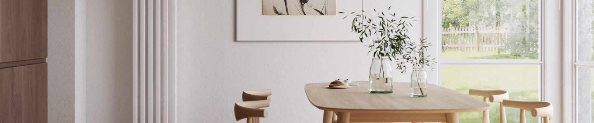 A tall, white vertical radiator stands out against the white wall, adding a modern touch.