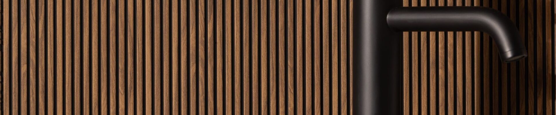 Microslat wall panels adds visual interest and warmth to the space.