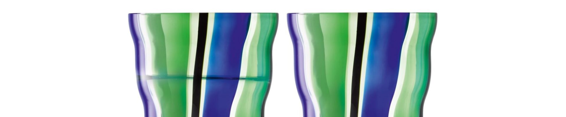 Two tall tumbler glasses. They are tall, cylindrical glasses with vibrant, abstract stripes in shades of green, blue, and black.