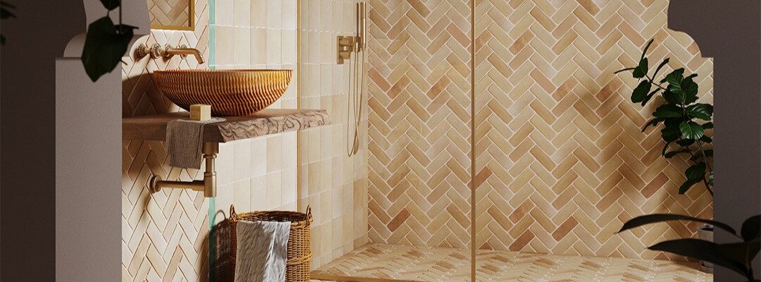 The intricate herringbone pattern and warm, earthy tones of the tiles are characteristic of Moroccan design.