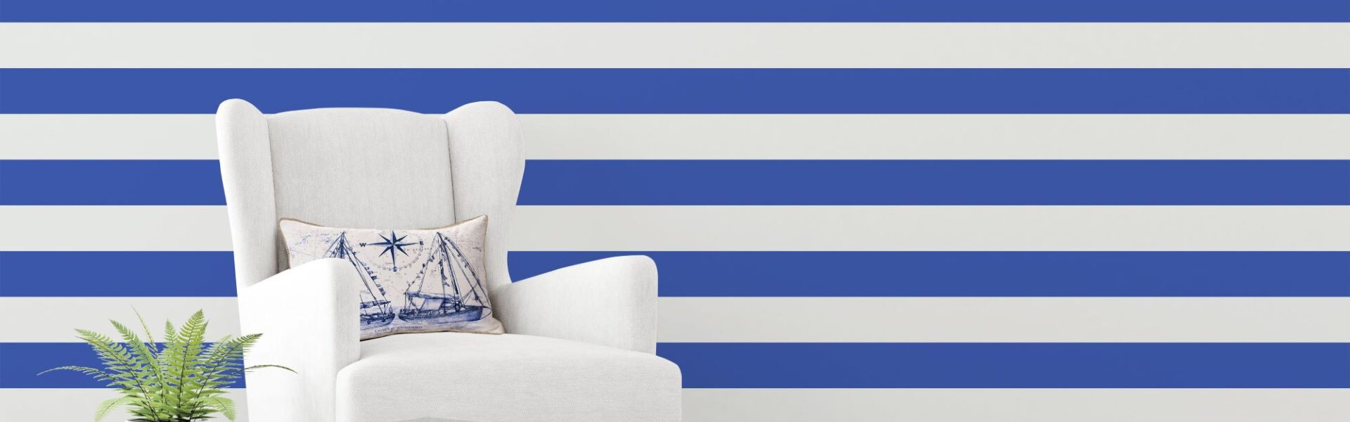 A living room wall with bold blue and white striped wallpaper