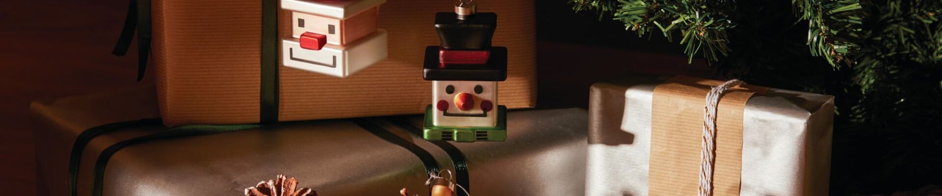 Contemporary Christmas ornaments in the shape of a snowman, Father Christmas and a star
