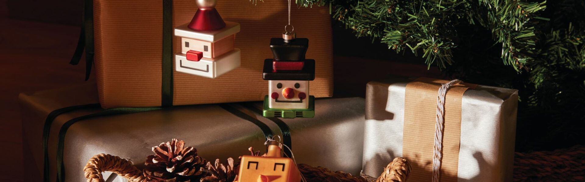 Contemporary Christmas ornaments in the shape of a snowman, Father Christmas and a star
