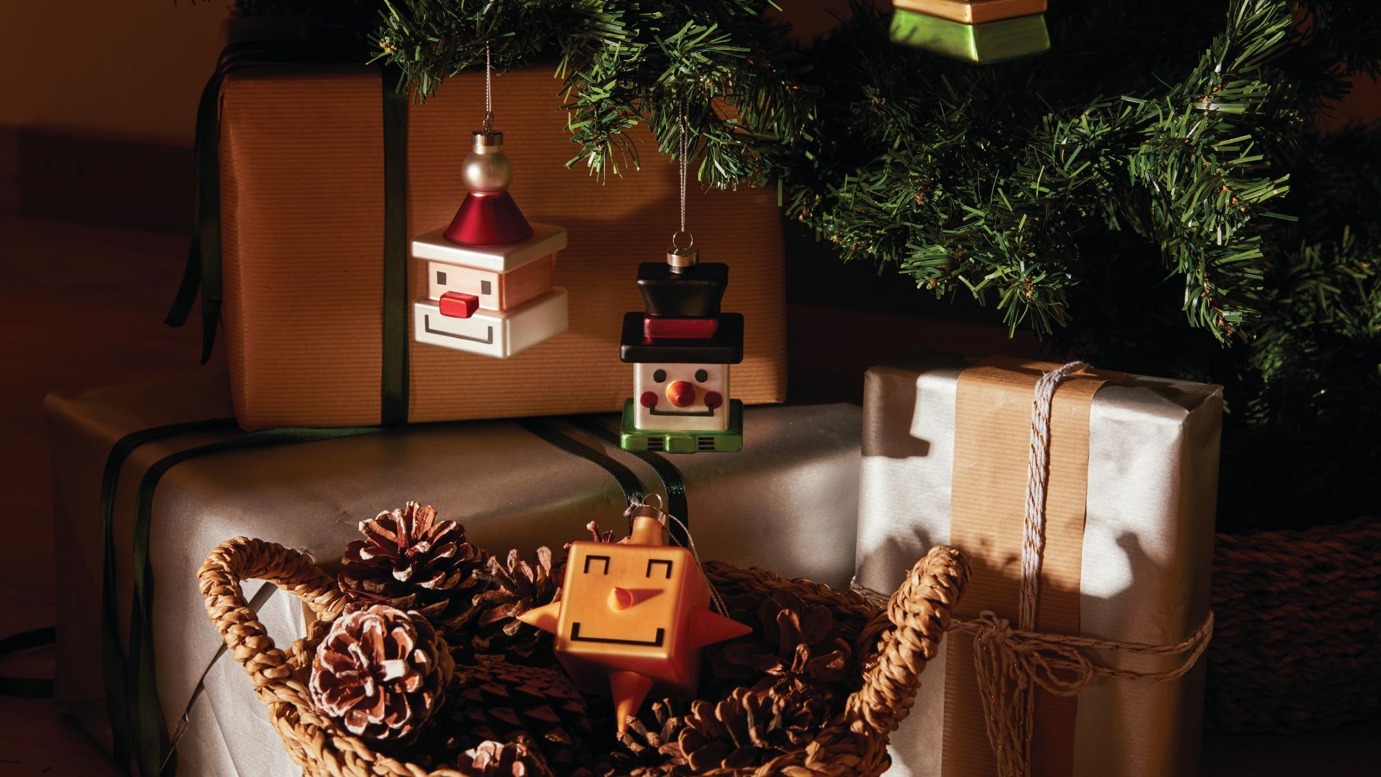 Contemporary Christmas ornaments in the shape of a snowman, Father Christmas and a star