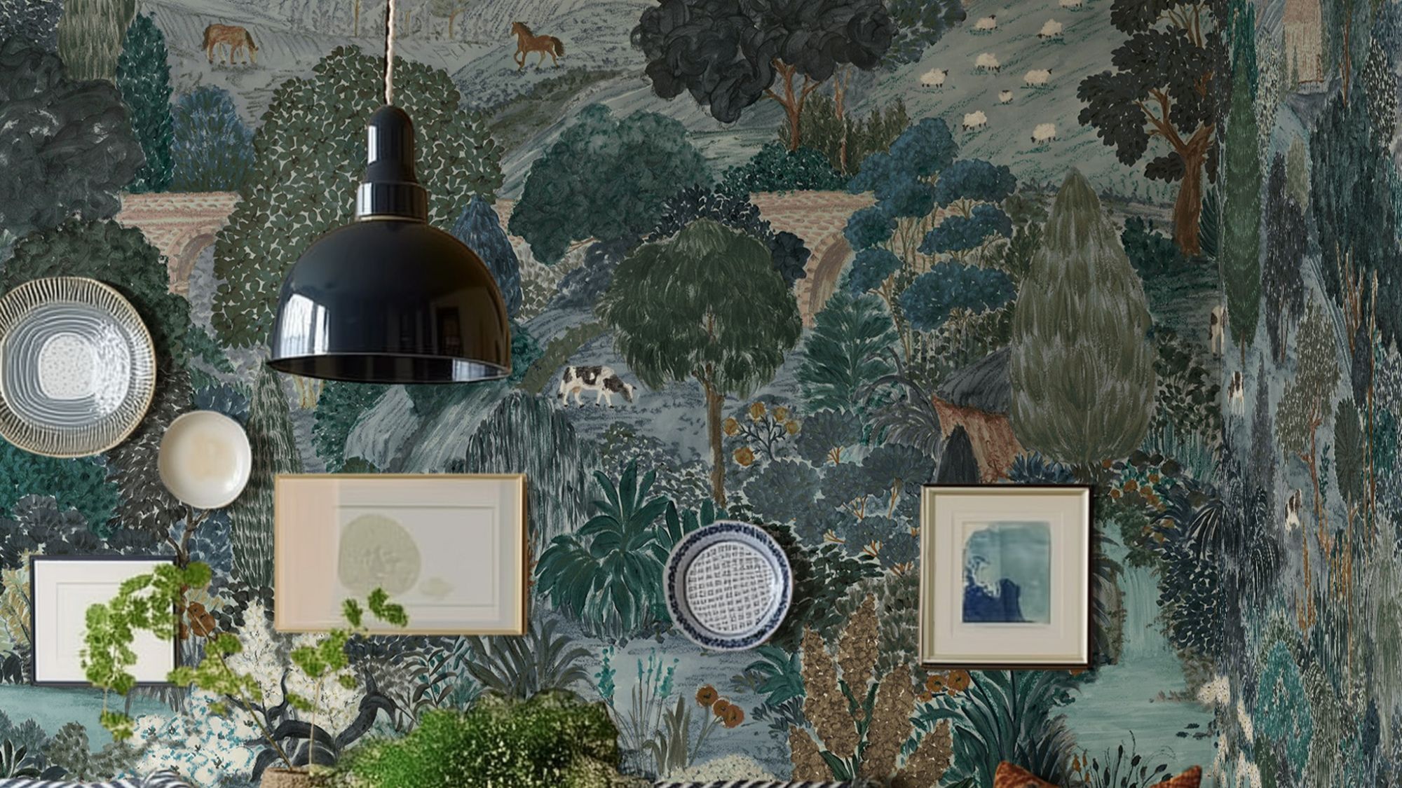 A beautifully decorated room featuring a wall adorned with a whimsical, illustrative wallpaper depicting a pastoral scene. The wallpaper, in shades of blue, green, and brown, shows rolling hills, trees, a bridge, and various animals like horses, sheep, and a cow.
