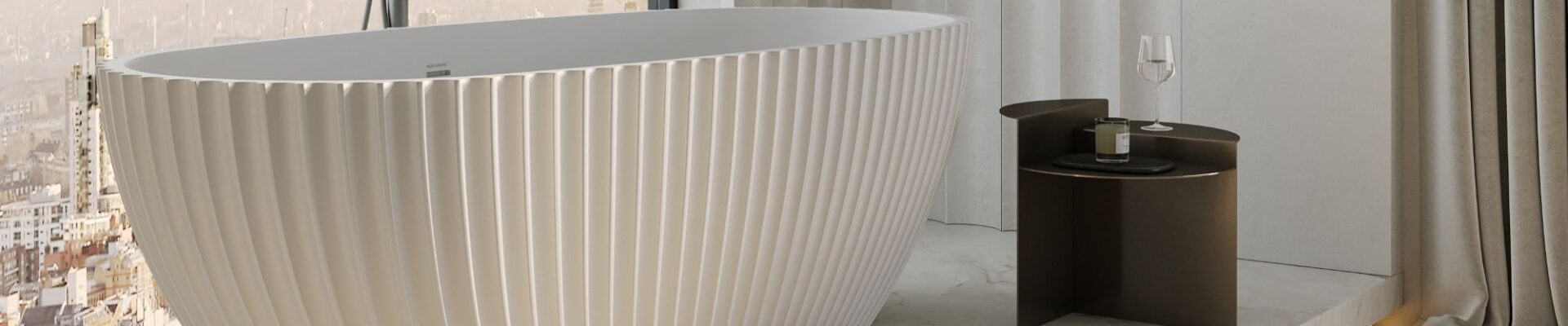 A luxurious and modern bathroom setting, dominated by a large, freestanding bathtub.