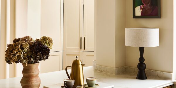 The image shows Thorndown's Whey White Wall Paint. It's an off-white cream with a light, buttery hue and a flat matt finish. It's an eco-friendly, water-based paint with minimal VOCs, and is designed to be durable and washable. It can be used on walls, ceilings, metal radiators, and interior wood like furniture and trim.