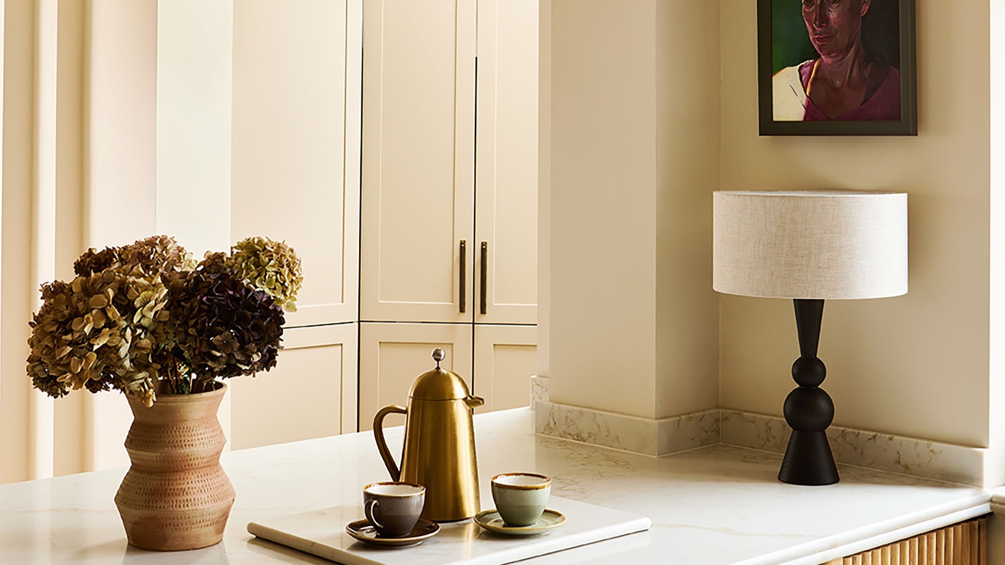 The image shows Thorndown's Whey White Wall Paint. It's an off-white cream with a light, buttery hue and a flat matt finish. It's an eco-friendly, water-based paint with minimal VOCs, and is designed to be durable and washable. It can be used on walls, ceilings, metal radiators, and interior wood like furniture and trim.